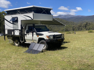 79 series with slide on camper
